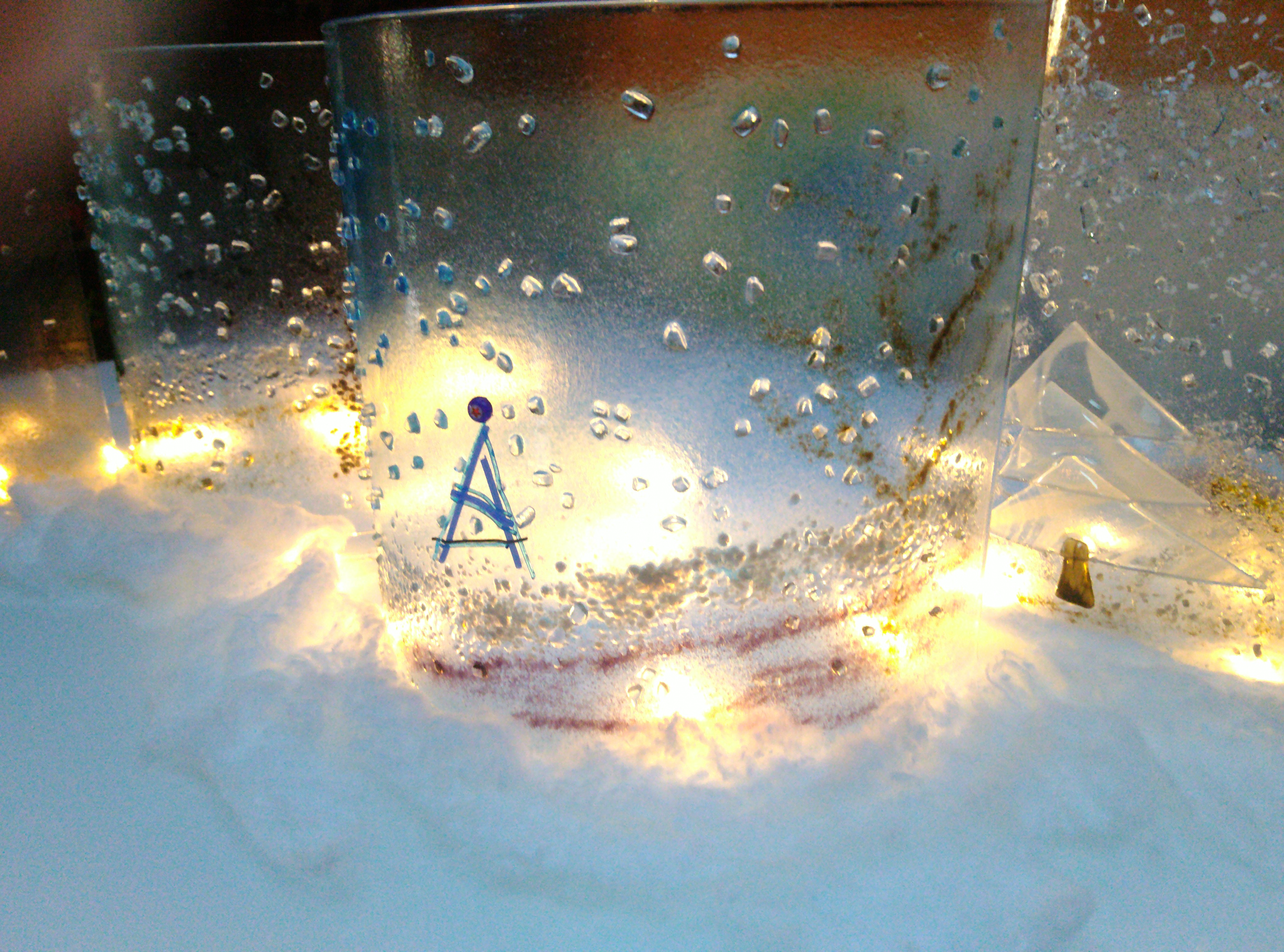 dreiteilige Winterlandschaft aus Glasbögen mit romantischer Beleuchtung